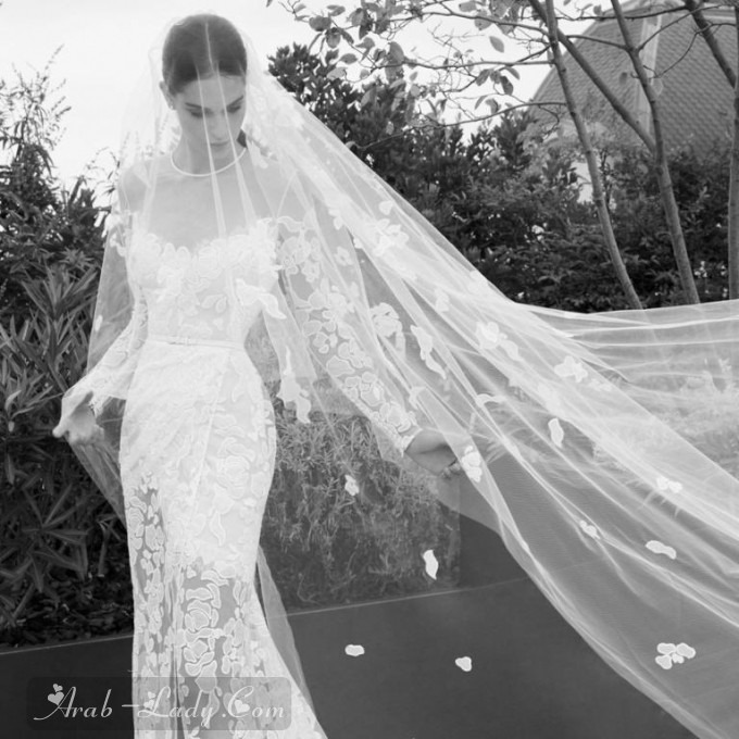 شاهدي أحدث فساتين الزفاف بأكمام شفافة لعروس 2019