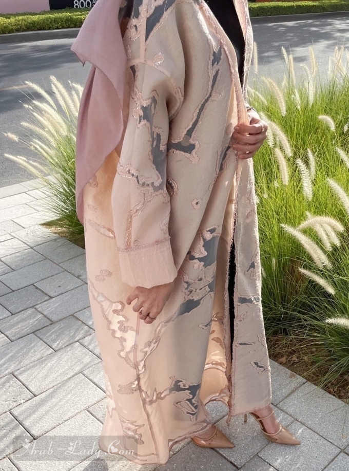 Elegant and classy Peach artistic abaya for special occasions