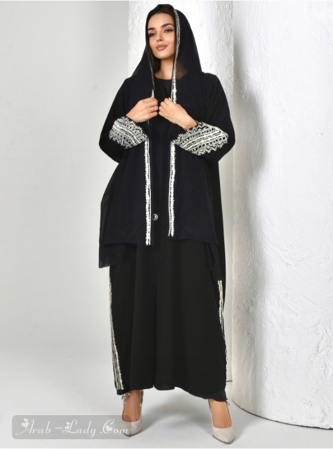 Black abaya with embroidered trimmings. Comes with a matching headscarf.